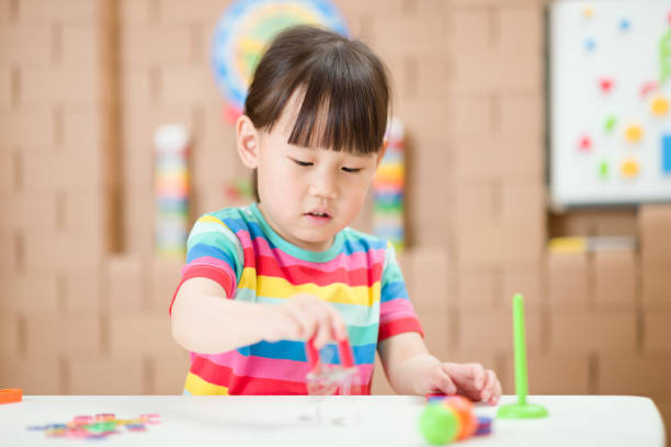 istock Young Girl Playing Science Experiment At Home 1316226090