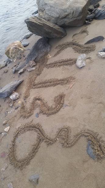 istock Abstract image with sea rocks and written (note this image is gift for getty images 1316227337