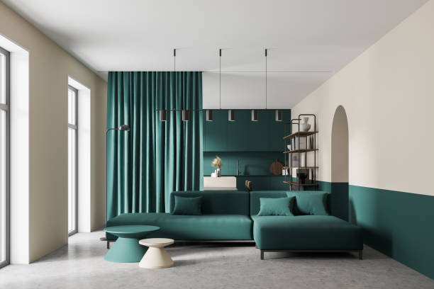 istock White and ocean green modern kitchen living room interior. Dining area with table. Concrete floor. Panoramic window. 1316229137