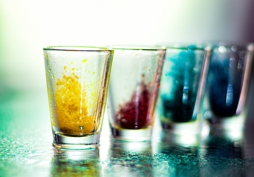 Creative colored experimental photography, improvising and enjoying the moment of freedom and open mind with some colors and drinking shots.