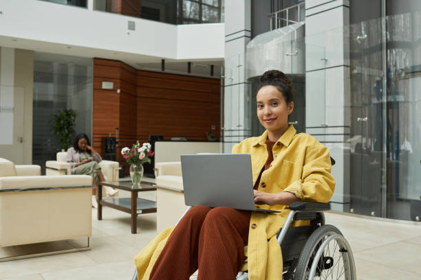 istock Disabled businesswoman working online 1316234233