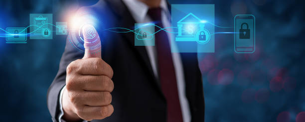 istock Protection network security computer fingerprint scan and safe financial stability Businessman holding shield protect icon to protect digital business finance bank and high private technology screen 1316237022