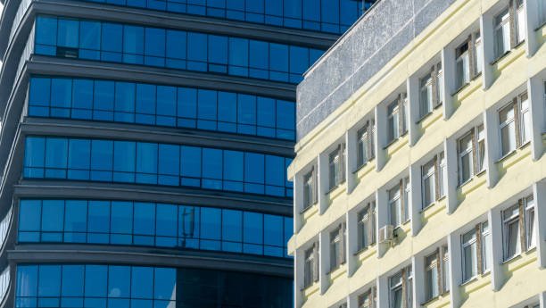 istock Fragment of a modern building. Modern architecture design. Structural glass facade of modern office building. Abstract architecture fragment. Architecture concept. 1316239672