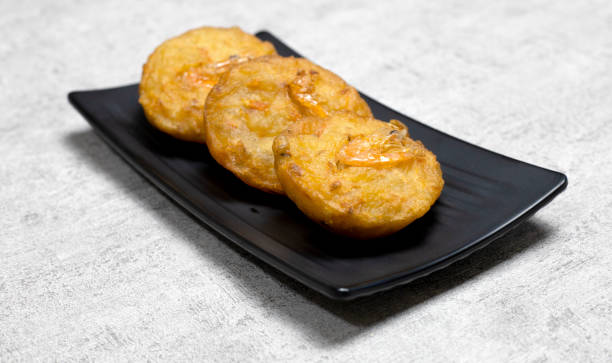 Delicious and tasty Bakwan Delicious and tasty Bakwan, a traditional snack from Indonesia gorengan stock pictures, royalty-free photos & images