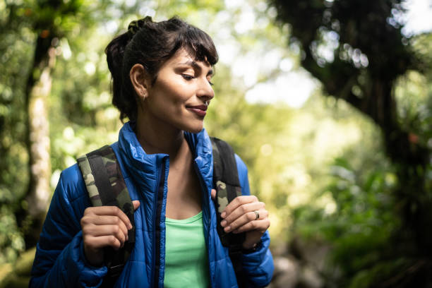 istock Young woman admining hiking in a forest 1316243254