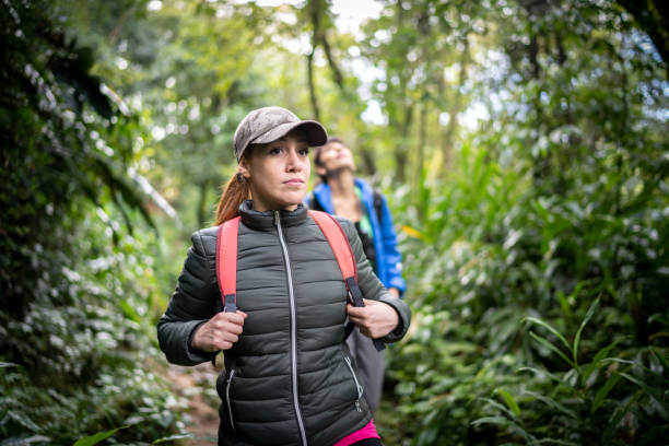 istock Women hiking with a group in a forest 1316243339