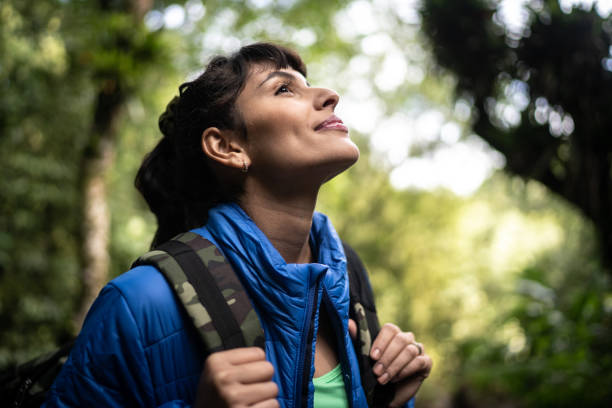 istock Young woman admining hiking in a forest 1316243403