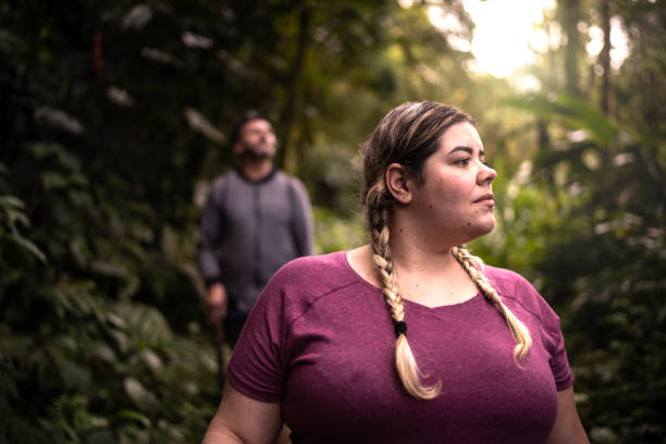 istock Woman admiring a forest during hiking 1316244129