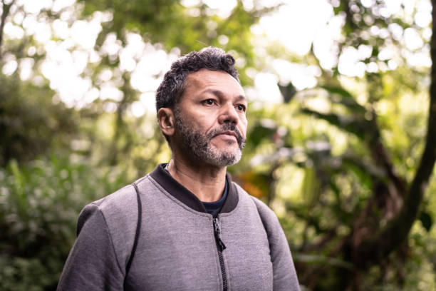 istock Mature man contemplating in a forest 1316244145