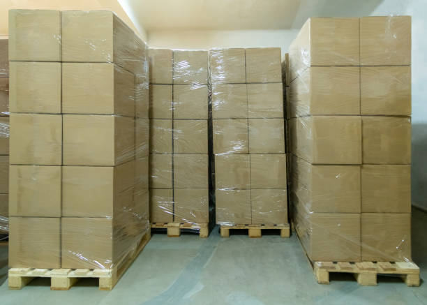 istock Stack of cardboard boxes ready to be shipped of a warehouse. Package storage room. 1316245421