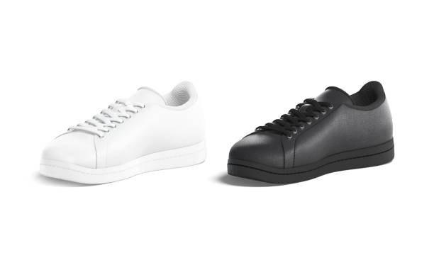 istock Blank black and white leather sneakers with lace mockup, isolated 1316245525
