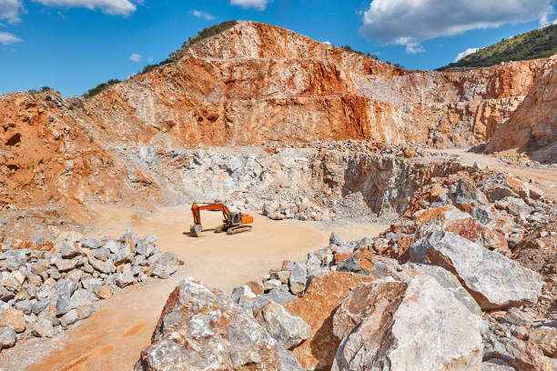 istock Heavy excavator on a quarry. Excavation machinery. Earthmover work 1316245971