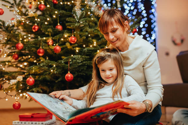 istock Mother and daughter bonding through book reading 1316247130