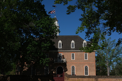 Williamsburg, Virginia USA, May1, 2021:  The Capitol at Williamsburg, Virginia housed both Houses of the Virginia General Assembly, the Council of State and the House of Burgesses of the Colony of Virginia from 1705, when the capital was relocated there from Jamestown, until 1780, when the capital was relocated to Richmond.