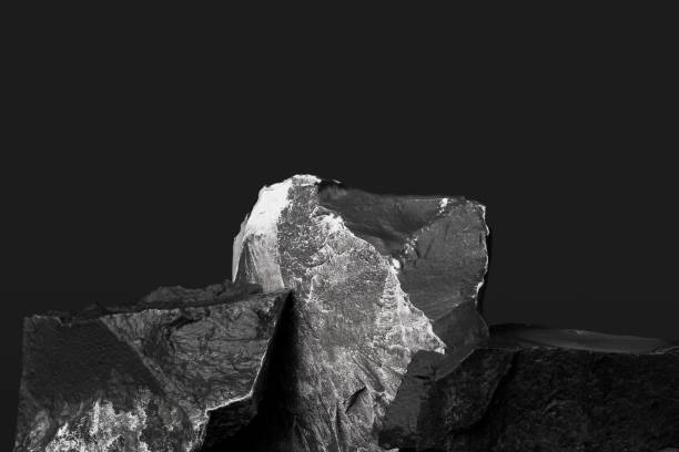 istock Black and white textured rocks, rough stone blocks pedestal, abstract platform dark background 3d rendering 1316248970