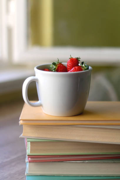 istock Strawberries and Books 1316249905