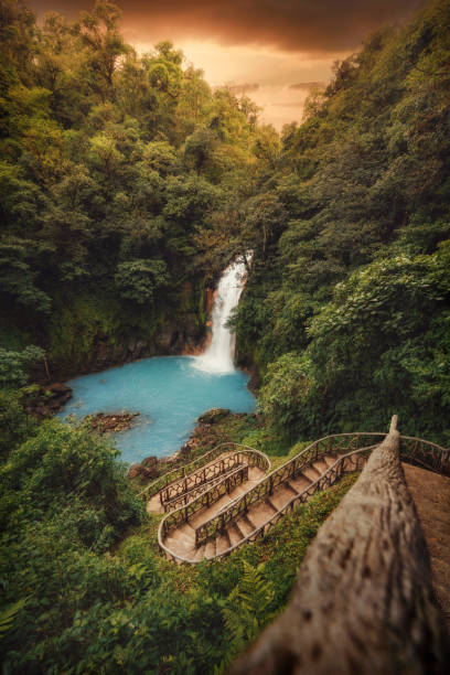 Volcan Tenorio Waterfall in the Jungle in Costa Rica Volcan Tenorio Waterfall in the Jungle in Costa Rica, post processed using exposure bracketing costa rica photos stock pictures, royalty-free photos & images
