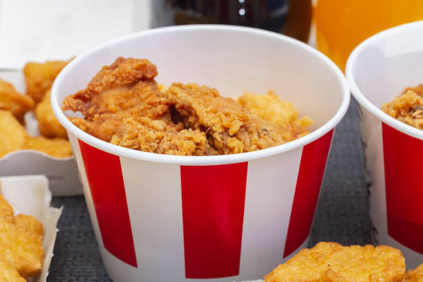 istock Chicken nuggets in batter of different types in paper packaging 1316252083