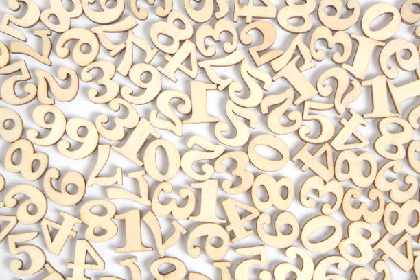 istock Wooden numbers from zero to nine on a white background, abstract background. 1316252993