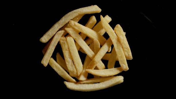 istock French Fries Potatoes On A Black Background 1316254138