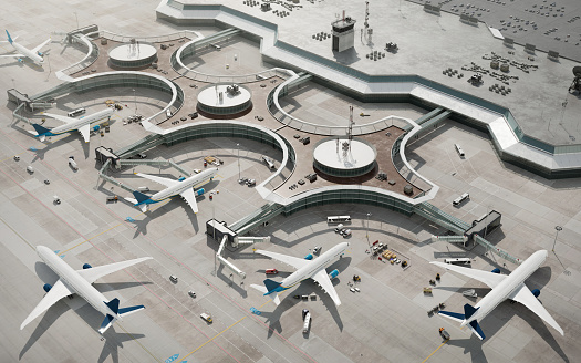 Vista de pájaro de la terminal del aeropuerto con aviones estacionados photo