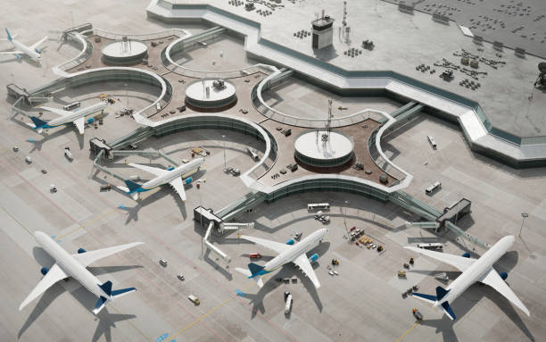 vue d’oeil d’oiseau du terminal d’aéroport avec des avions stationnés - industrie aérospatiale photos et images de collection