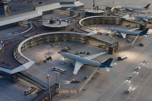 Aerial view of Airport with many airplanes at evening. 3D rendering of commercial aircrafts at airport terminal.
