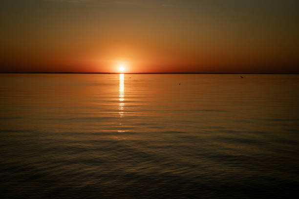 istock beautiful sunset over the calm sea. 1316257472
