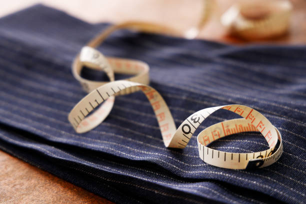 istock Men's clothing fabric and tape measure tailor image 1316259231