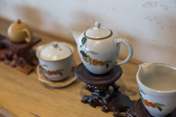 istock Asian food background with a tea set, cups, and teapot. 1316260520