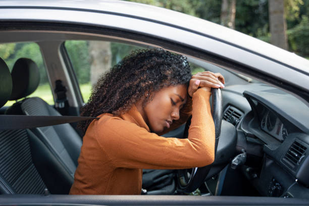 istock Frustrated angry woman stuck in traffic jam 1316260564