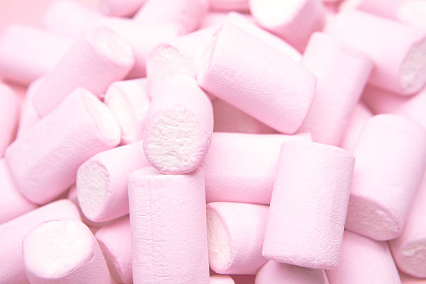 istock Soft pink marshmallow candies background 1316264110