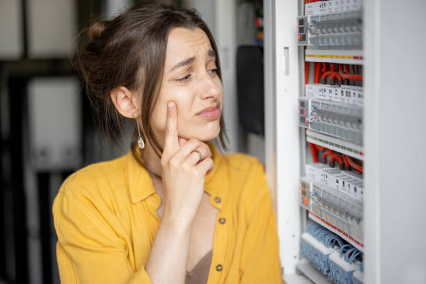 istock Woman checking bills for electricity at home 1316264552