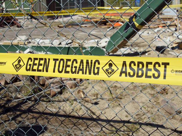 Dutch warning sign: prohibited access due to asbestos. stock photo