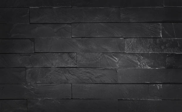 istock Dark grey black slate texture with high resolution, pattern of stone brick wall for background and design art work. 1316266953
