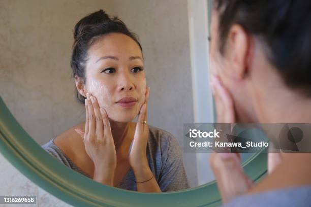 Indonesian Woman Washing Her Face Using Beauty Cleanser Soap Stock Photo - Download Image Now
