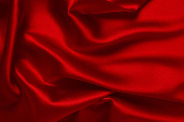 istock Red silk or satin luxury fabric texture can use as abstract background. Top view. 1316270981