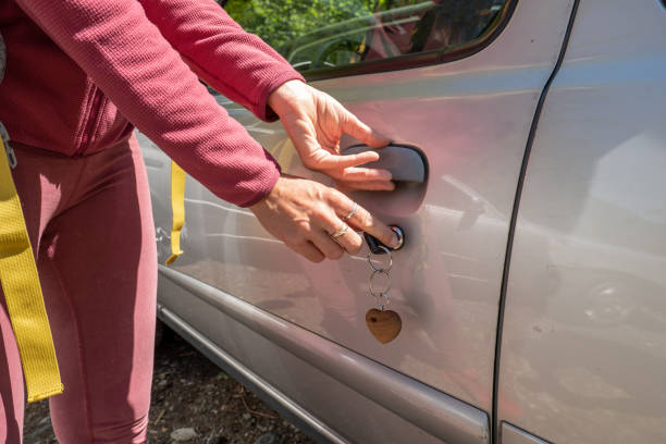 istock Female hiker open car door 1316272001