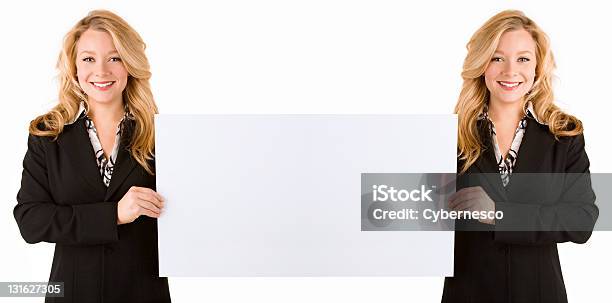 Mirrored Effect Of Woman Holding A Large Blank Card Stock Photo - Download Image Now