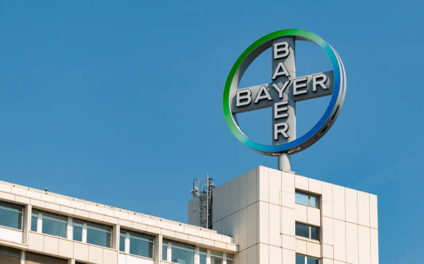 Bayer Logo Headquarters Berlin, Germany - May 23, 2016: A picture of Bayer's logo on top of their Berlin's headquarters. headquarters photos stock pictures, royalty-free photos & images