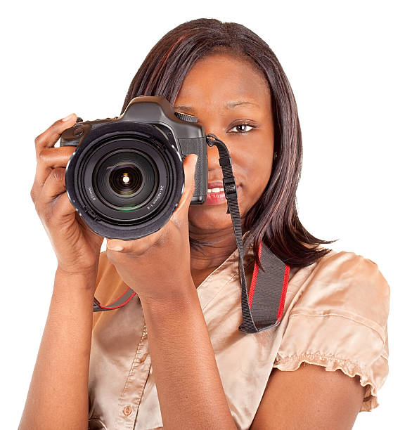 istock A young female photographer holding a camera 131627534