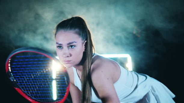 istock Lady player is being focused while playing tennis 1316276889