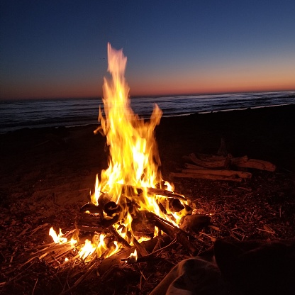 Sunset beach bonfire to make some smores and stay warm for the beautiful sunset