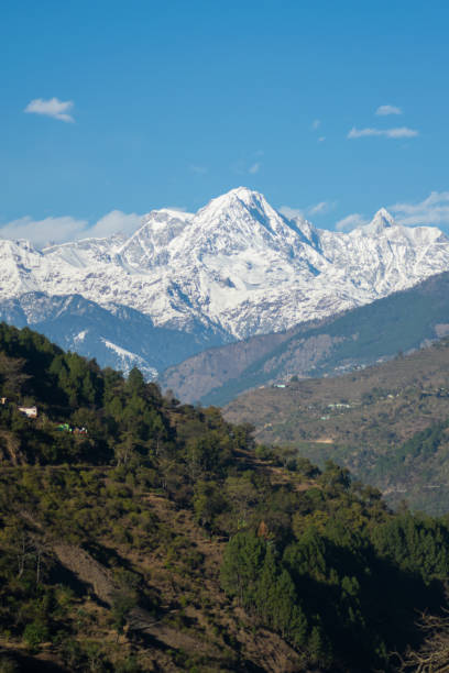 istock snow covered mountains and forests in Uttarakhand , India 1316278723