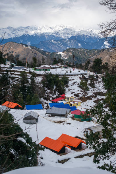 istock snow covered mountains and forests in Uttarakhand , India 1316278877