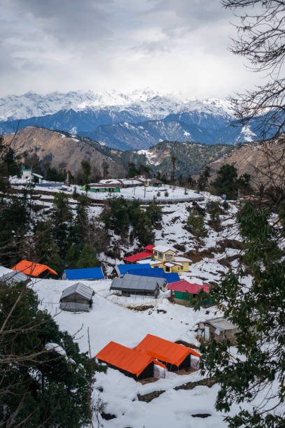 istock snow covered mountains and forests in Uttarakhand , India 1316278993
