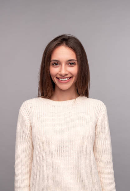 istock Cheerful young woman smiling for camera 1316282231