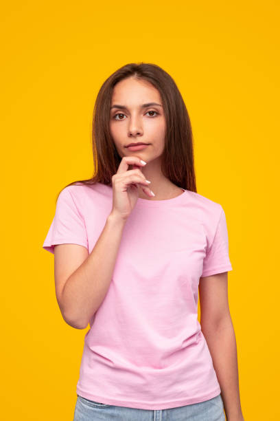 istock Young female touching chin and thinking 1316282271