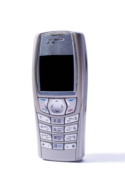 istock Old mobile push-button telephone. Personal phone with a small screen. 1316284444