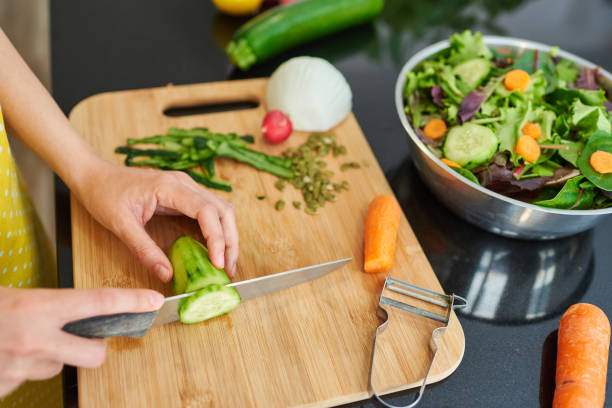 istock Top view of a cutting board and a salad 1316285912